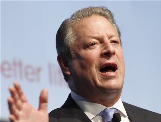 FILE - In this Oct. 27, 2010 file photo, former US Vice President Al Gore speaks in Milan, Italy. Sarah Palin and George W. Bush won�t be in Tampa. Hillary Rodham Clinton and Al Gore aren�t making the trip to Charlotte. And scores of other Republican and Democratic stars are taking a pass as their parties gather at every-four-years national conventions. The reasons are varied _ and political. (AP Photo/Luca Bruno, File)