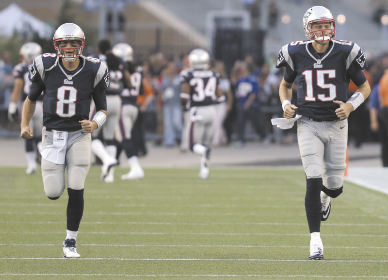 FIGHTING TO BACK UP BRADY: New England Patriots quarterbacks Brian Hoyer, left, and Ryan Mallett both saw significant time in the Patriots’ 27-17 preseason loss to the Philadelphia Eagles on Monday. Hoyer was 5 for 17 for 55 yards and was sacked twice, while Mallett was 10 for 20 for 105 yards and a touchdown.
