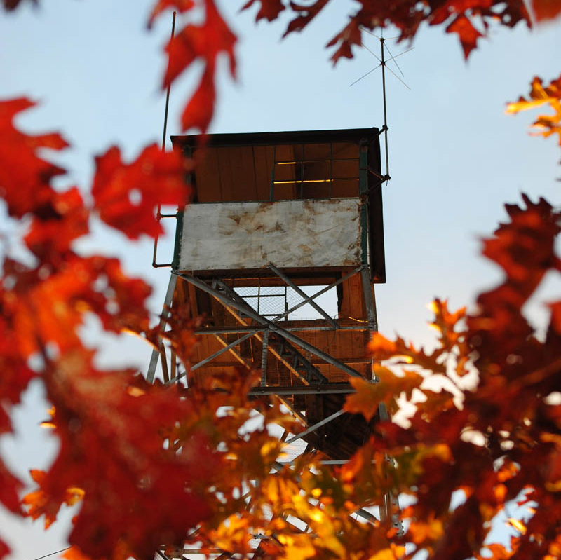 The 60-foot fire tower atop Mount Pisgah in Winthrop has been hit by vandals twice this year.