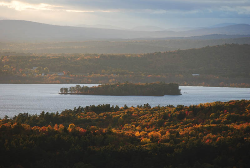 The fire tower on top of Mount Pisgah offers some of the best views in central Maine. This is a view to the west with Androscoggin Lake in the foreground and the White Mountains in the back.
