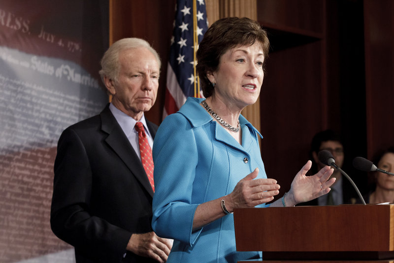 Sen. Susan Collins, R-Maine, the ranking member of the Senate Homeland Security Committee, right, accompanied by the committee's Chairman Sen. Joseph Lieberman, I-Conn., gestures during a news conference on Capitol Hill in Washington, Tuesday, July 24, 2012, to announce that the Senate will take up legislation later this week to protect critical U.S. industries and other corporate networks from cyberattacks and electronic espionage. (AP Photo/J. Scott Applewhite)