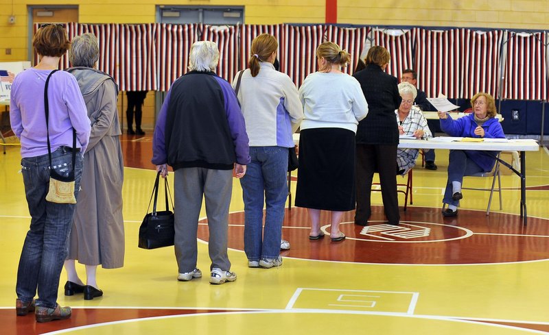 Voters line up to cast their ballots in South Portland on Nov. 8, 2011. A nationwide News21 investigation of fraud claims since 2000 found just 10 cases of alleged in-person voter impersonation – about one for every 15 million registered voters.