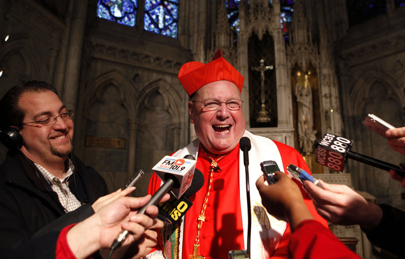 New York Cardinal Timothy Dolan speaks to the media after leading a morning prayer service at St. Patrick’s Cathedral in New York City earlier this year.