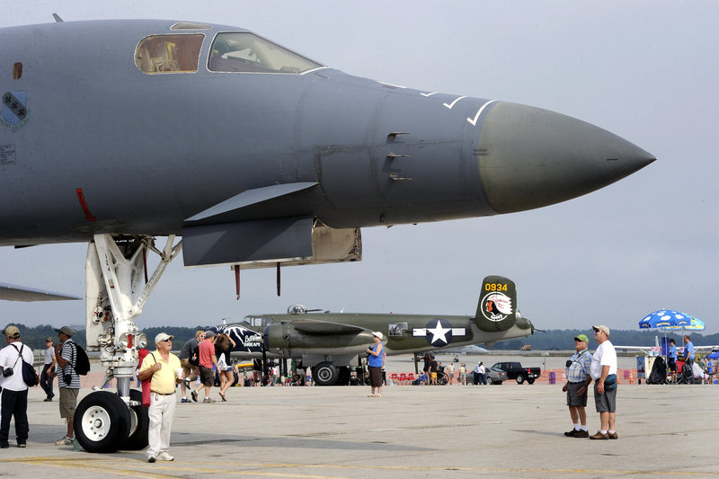A modern B-1 bomber and a World War II B-25 bomber draw attention at The Great State of Maine Air Show in Brunswick on Saturday. This is the second year since the Brunswick Naval Air Station closed that the event has been held.