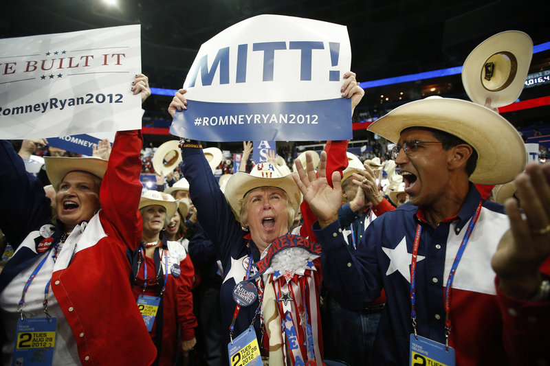 Texas delegates cheer as Mitt Romney is nominated for the office of the president of the United States, at the Republican National Convention in Tampa, Fla., on Tuesday.