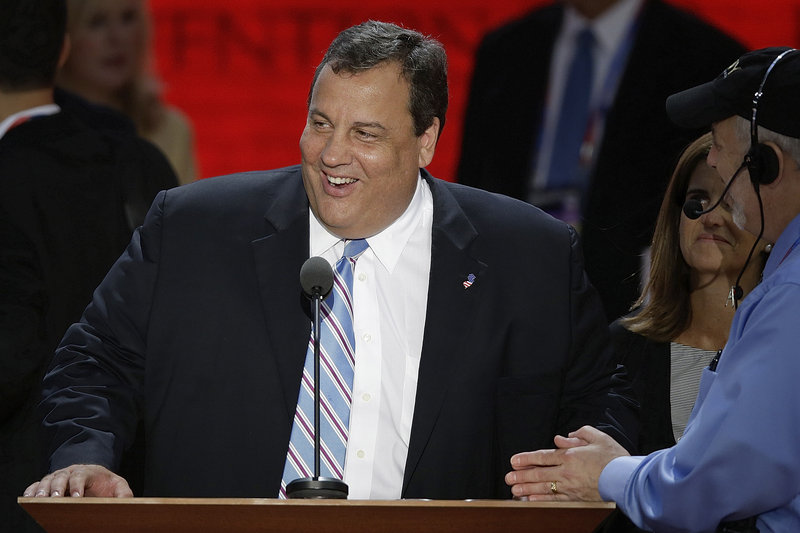 N.J. Gov. Chris Christie, the keynote speaker, looks over the podium during a sound check before his speech.