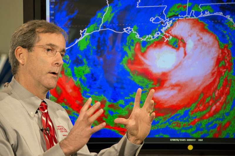 Ed Rappaport, deputy director of the National Hurricane Center in Miami, briefs a national television audience as Hurricane Isaac prepared to make landfall Tuesday evening.