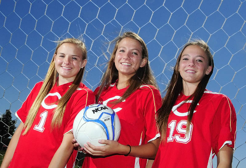 TRIPLETS: Lindsey Quirion, left, Hayley Quirion and Emily Quirion are playing for the Cony Rams soccer team this season.