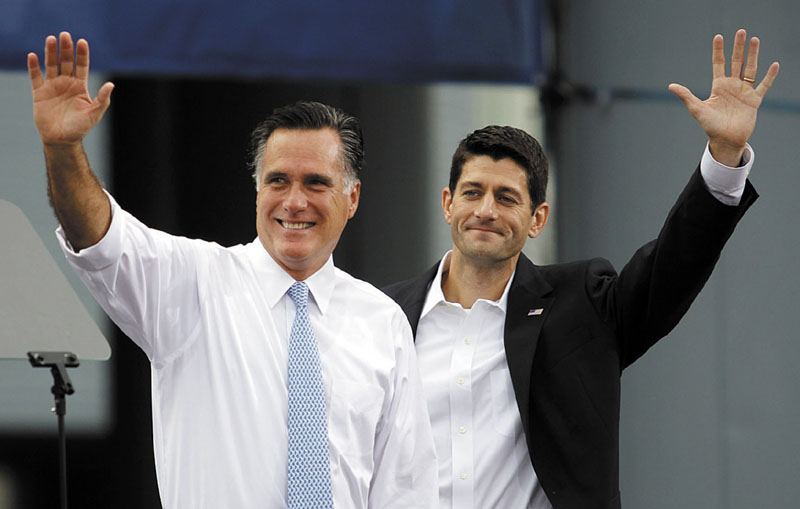 2012 ELECTION: Republican presidential candidate Mitt Romney, left, introduces his vice presidential running mate, Wisconsin Rep. Paul Ryan, on Saturday in Norfolk, Va. Romney