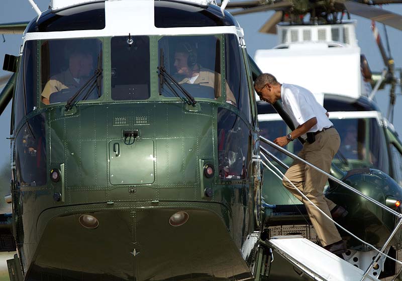 President Barack Obama boards Marine One helicopter as he departs Andrews Air Force Base, Md., for Camp David, Saturday. President Obama celebrated his 51st birthday Saturday with a round of golf and plans for a quiet weekend at Camp David, taking a break from campaigning three months before Election Day.