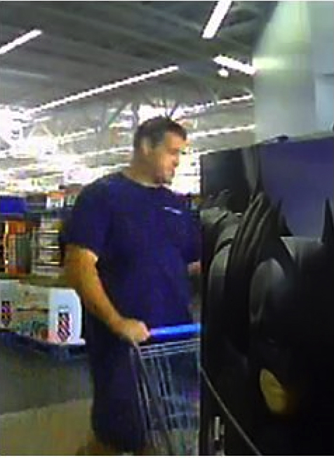 This surveillance image provided by Scarborough police shows the suspect inside Walmart before leaving the store.