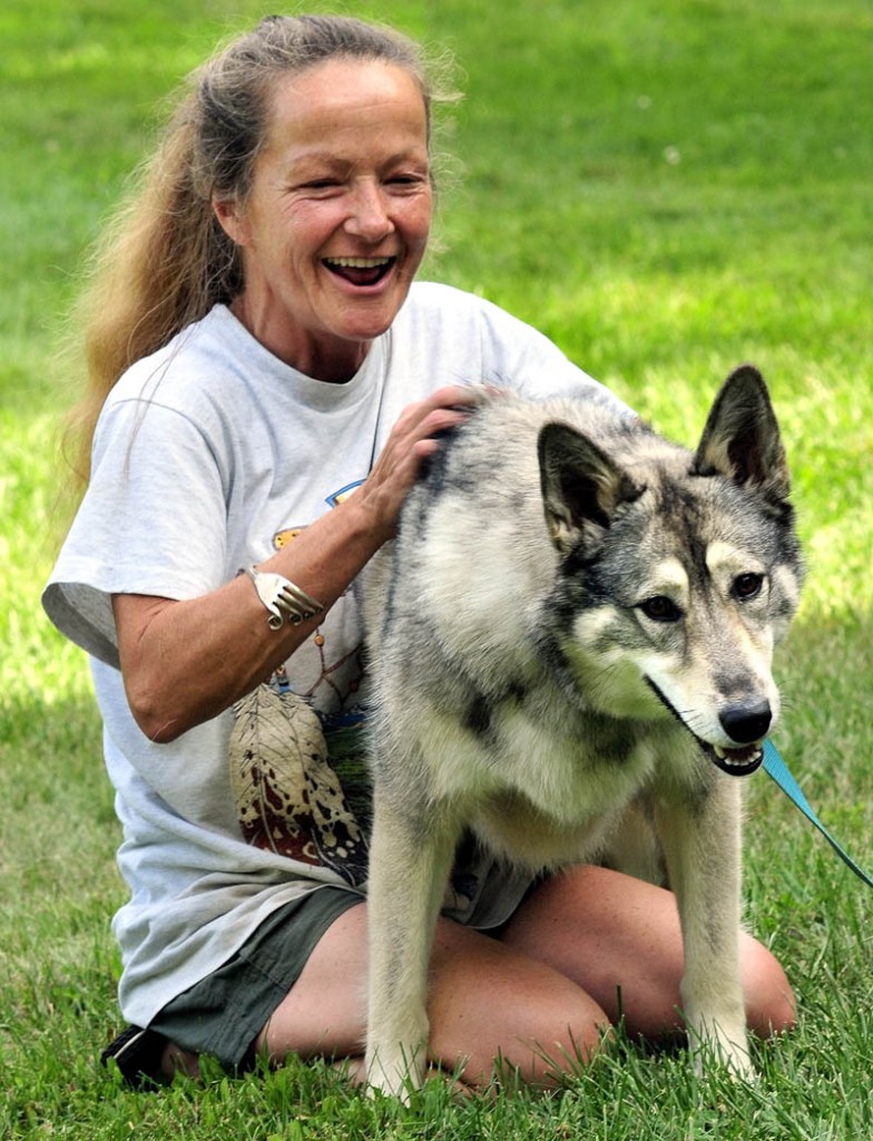 A WOLF HYBRID NAMED WOLF: Julie Mitchell and her husband Gene of Detroit are raising a two-year-old wolf hybrid named Wolf.