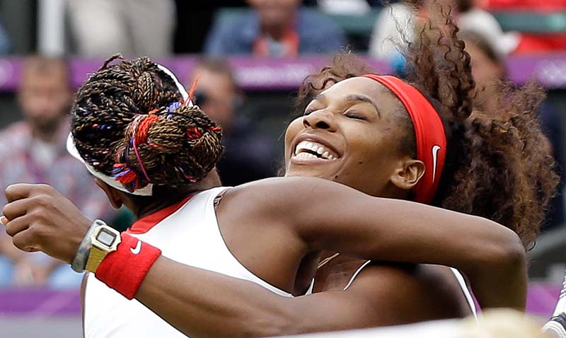 Serena Williams, right, and Venus Williams of the United States celebrate their victory against Andrea Hlavackova and Lucie Hradecka of the Czech Republic in the gold medal women's doubles match Sunday in London. 2012 London Olympic Games Summer Olympic games Olympic games Spo