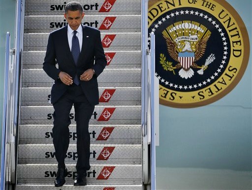 President Barack Obama steps off Air Force One upon his arrival, Monday, Sept. 24, 2012, at JFK airport in New York. (AP Photo/Pablo Martinez Monsivais)