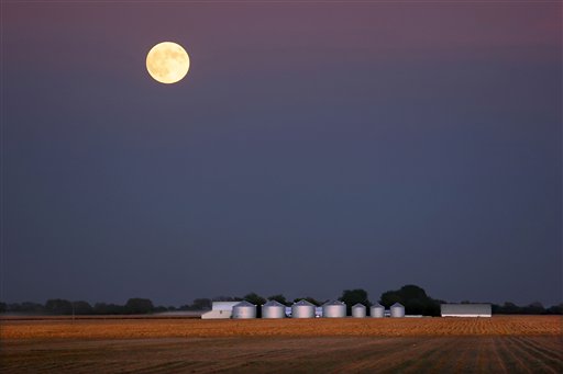 The moon rises over a freshly harvested corn field on a farm in Pleasant Plains, Ill. With the current farm bill scheduled to expire Sept. 30, competing versions of a new farm bill – which encompasses everything from crop subsidies to disaster relief and food stamps – have passed the full Senate and the House Agriculture Committee. But House Republican leaders have yet to allow a floor vote.