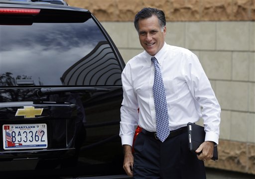 Republican presidential candidate Mitt Romney arrives at his campaign headquarters in Boston, to prepare for the presidential debates on Sunday.