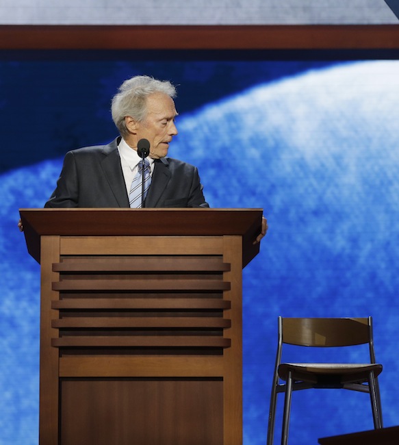 This Aug. 30, 2012 file photo shows actor Clint Eastwood addressing an empty chair at the Republican National Convention in Tampa, Fla. More than a week after Clint Eastwood delivered a speech to the Republican National Convention, the veteran Hollywood actor-director continues to be mocked for his peculiar, rambling conversation with an imaginary President Barack Obama in an empty chair on stage, begging the question: Will his latest film also be playing to empty seats when it debuts later this month? (AP Photo/Charles Dharapak, file)