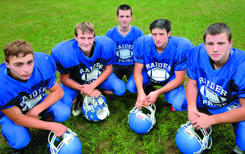Staff photo by Andy Molloy RUNNING HARD: Oak Hill High School's running backs are, from left, Alex Mace, Kyle Flaherty, Joel Wells, Brandon Potvin and Aaron Clark.