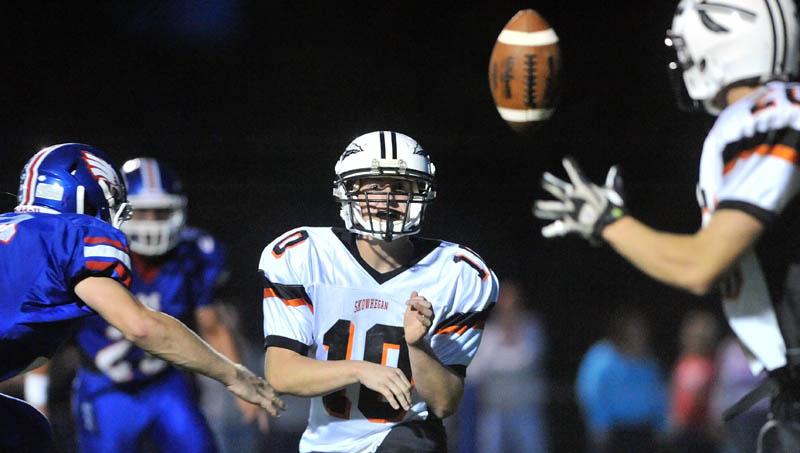 MAKING PLAYS: Adam Clukey is in his first year as the starting quarterback for the Skowhegan Area High School football team, which is running a new spread offense. Clukey has thrown for 855 yards and seven touchdowns.