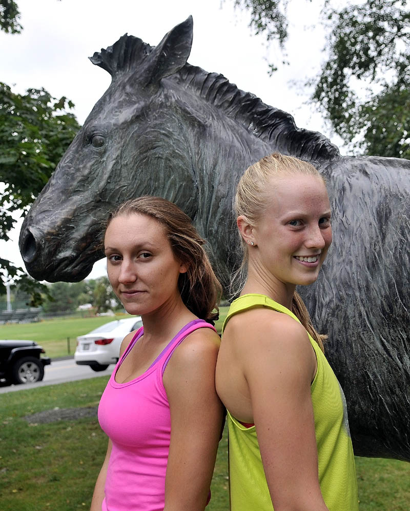 MULE POWER: Colby College’s Berol Dewdney, left, and Morgan Lingar are the cross country captains this season.