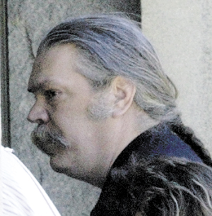 Mark Bechard walks into Kennebec County Superior Court in Augusta for a court appearance in 2006.