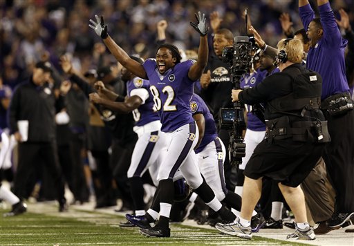 Baltimore Ravens wide receiver Torrey Smith (82) reacts after kicker Justin Tucker kicked a field goal in the final moments of an NFL football game against the New England Patriots in Baltimore, Sunday, Sept. 23, 2012. New England won 31-30. (AP Photo/Patrick Semansky)