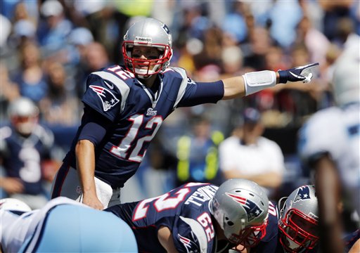 New England Patriots quarterback Tom Brady (12) calls a play in the first quarter of an NFL football game against the Tennessee Titans on Sunday, Sept. 9, 2012, in Nashville, Tenn. (AP Photo/Joe Howell) LP Field