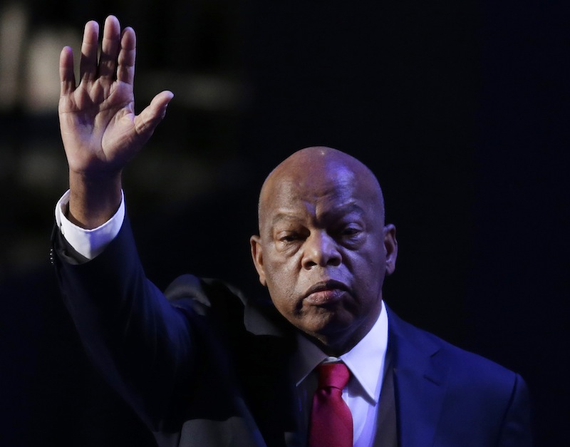 FILE - In this Sept. 6, 2012 file photo, Rep. John Lewis of Georgia waves to delegates at the Democratic National Convention in Charlotte, N.C. For decades, Southerners put a firm imprint on national politics from both sides of the aisle, holding the White House for 25 of the last 50 years and producing a legion of Capitol Hill giants throughout the 20th century. But that kind of obvious power has waned as Democrats and Republicans in the region navigate the consequences of tidal shifts in demographics, migration and party identity. (AP Photo/Lynne Sladky, File)