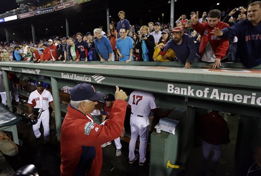 Boston Red Sox manager Bobby Valentine gestures a thumbs-up to fans after their last home baseball game of the season at Fenway Park in Boston, against the Tampa Bay Rays, Wednesday, Sept. 26, 2012. The Rays won 4-2. (AP Photo/Elise Amendola)