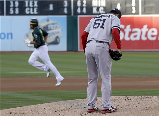 Oakland Athletics' Coco Crisp (4) rounds the bases after hitting a solo home run off of Boston Red Sox starting pitcher Felix Doubront (61) in the first inning of a baseball game Saturday, Sept. 1, 2012 in Oakland, Calif. (AP Photo/Tony Avelar)