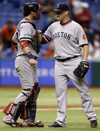 Boston Red Sox relief pitcher Andrew Bailey, right, celebrates with catcher Jarrod Saltalamacchia after closing out the Tampa Bay Rays during the ninth inning of a baseball game, Tuesday, Sept. 18, 2012, in St. Petersburg, Fla. Boston won the game 7-5. (AP Photo/Chris O'Meara) Tropicana Field