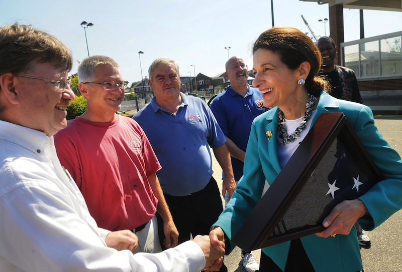Maine Senator, Olympia Snowe, says good-bye to Portsmouth Naval Shipyard workers from left, Mark Nelson, Paul O'Connor, Arvard Worster, Mike Melhorne and Jeffery Phillips, after a ceremony held in Kittery, Maine, Friday, Sept. 14, 2012. Snowe told shipyard workers that she'll never forget what they have done for the nation's defense and called them "simply the best." Snowe also expressed confidence that the fire-damaged USS Miami will be restored by shipyard workers to "better than new." (AP Photo/The Herald, Deb Cram)