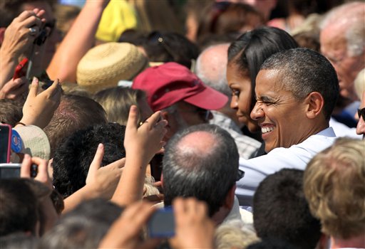 President Barack Obama greets supporters during a campaign stop , Friday, Sept. 7, 2012, in Portsmouth, N.H. (AP Photo/Jim Cole)