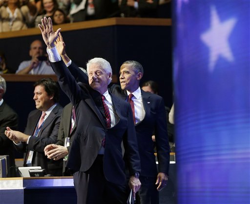 President Barack Obama, right, joins former President Bill Clinton, left, on stage at the Democratic National Convention, Wednesday, Sept. 5, 2012, in Charlotte, N.C. (AP Photo/Pablo Martinez Monsivais)