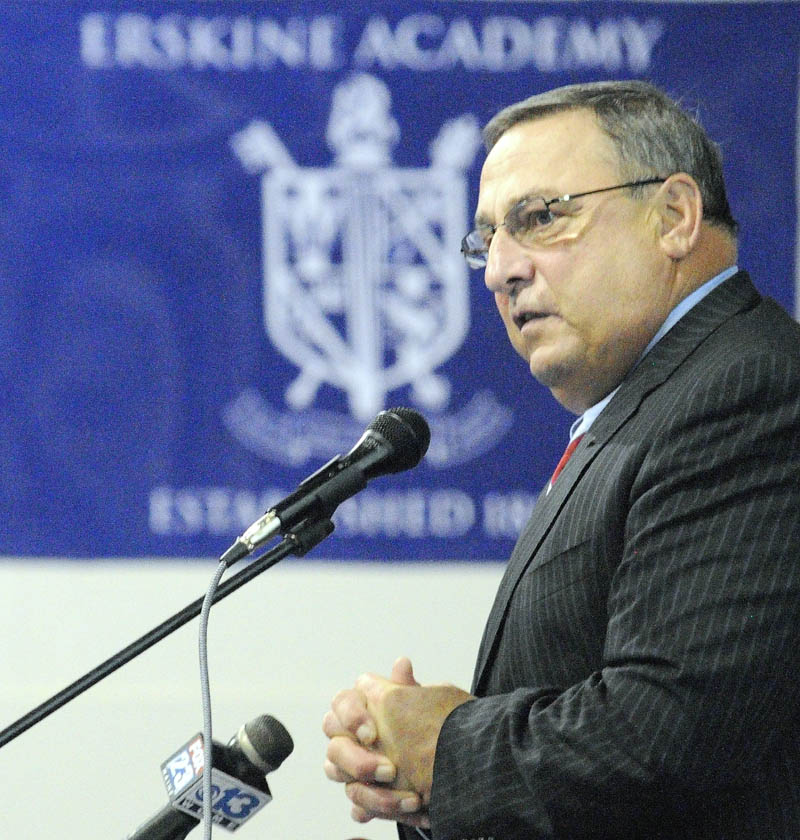 Staff photo by Joe Phelan Gov. Paul LePage speaks to students assembled in the gym on Wednesday afternoon at Erskine Academy in China. LePage spoke about stopping domestic abuse and violence. After speaking the governor took questions from the audience.