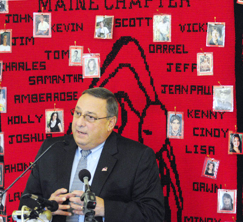Staff photo by Joe Phelan Gov. Paul LePage speaks at the 6th Annual Maine Day of Rememberance for Murder Victims on Tuesday afternoon at the University of Maine at Augusta.