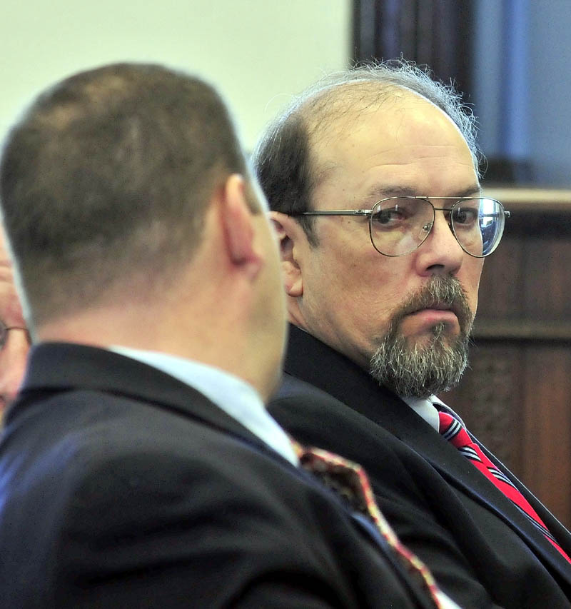 Murder defendant Jay Mercier looks around in court during his trial in Somerset County Superior Court in Skowhegan on Thursday in the death of Rita St. Peter 32 years ago.