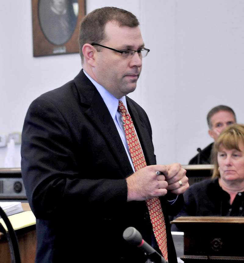 Defense attorney John Martin speaks with jurors during the trial of his client Jay Mercier in Somerset County Superior Court in Skowhegan on Thursday.