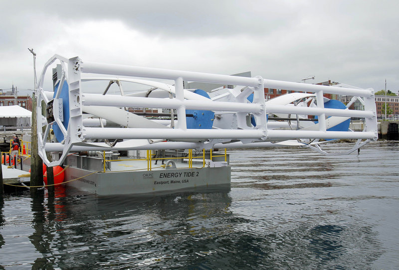 In this June 13, 2011 file photo, the Energy Tide 2, the largest tidal-energy turbine ever deployed in the U.S., appears on a bare in Portland, ME. North America's first-ever tidal turbine started supplying energy to the grid on Sept. 13, 2012, generating power from the bottom of Cobscook Bay in Maine.