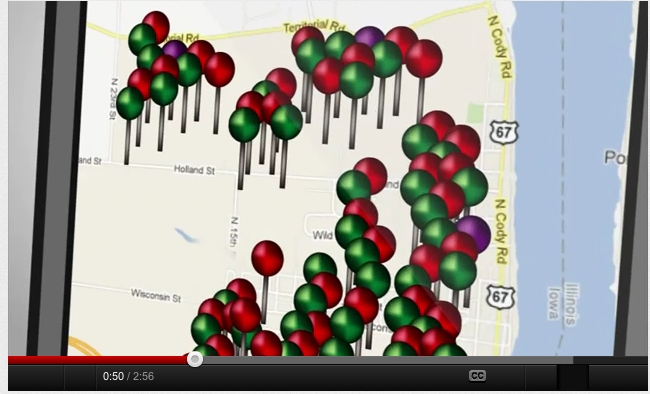 A YouTube demonstration video shows how the Mobile Voter app uses colored pins to distinguish the party affiliations of voters in a neighborhood.