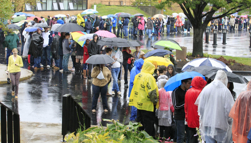 Students line up Wednesday outside the Memorial Athletic and Convocation Center at Kent State University in Kent, Ohio, to hear President Obama speak. College students are among the groups selected by tea party activists in Ohio to target for purging from voter lists.
