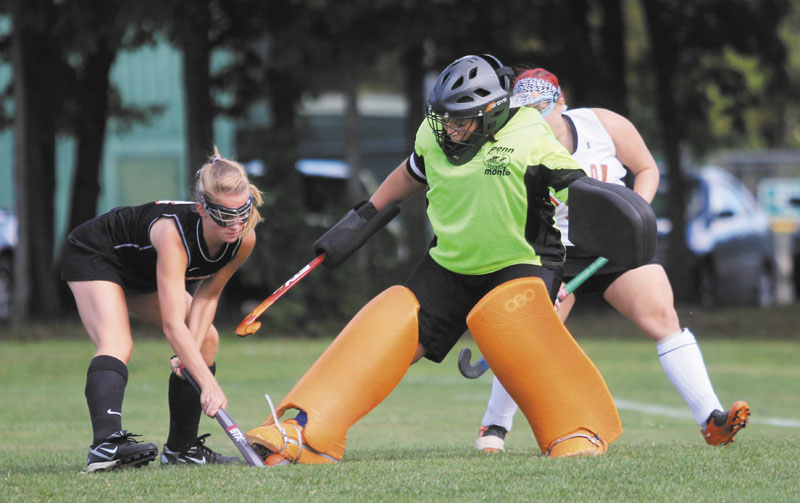 PUTTING A STOP TO IT: Winslow High School goalie Alexis Lachance stops a shot by Gardiner Area High School's Madeline Reny during the first half of Monday's game in Winslow.