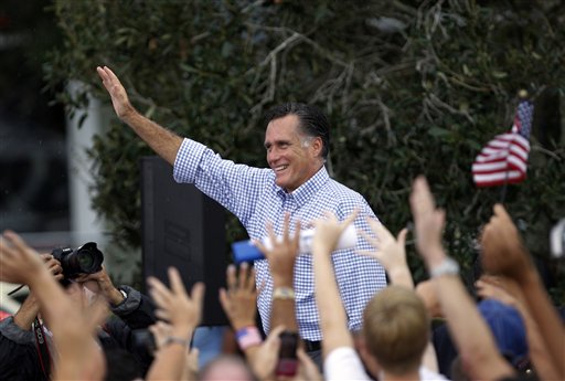 Republican presidential candidate and former Massachusetts Gov. Mitt Romney waves following a campaign rally, Sunday, Oct. 7, 2012 in Port St. Lucie, Fla. (AP Photo/Lynne Sladky)