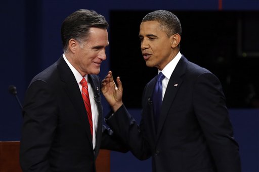 FILE - In this Oct. 3, 2012 file photo, Republican presidential candidate, former Massachusetts Gov. Mitt Romney and President Barack Obama talk after the first presidential debate in Denver. There they go again. Or do they? When President Barack Obama and Mitt Romney debate Tuesday night, the fact-checking media will be watching for the erroneous claims that have popped up repeatedly in the campaign, as well as brand new ones. Here's how you can play fact-check Whac-A-Mole, too. (AP Photo/Charlie Neibergall, File)