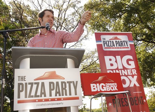 IMAGE DISTRIBUTED FOR PIZZA HUT - The Pizza Party campaign manager Scott Morehead fires up party supporters at a campaign rally on Monday, Oct. 1 at the Pizza Hut headquarters in Plano, Texas. Nationwide, Party backers can visit www.pizzahut.com/pizzaparty to register as supporters to receive special offers and help select the running mate for The Big Dinner Box. (Richard W. Rodriguez/AP Images for Pizza Hut)
