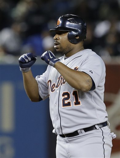 Detroit Tigers designated hitter Delmon Young gestures after driving in a run in the 12th inning of Game 1 of the American League championship series against the New York Yankees Sunday, Oct. 14, 2012, in New York. (AP Photo/Paul Sancya )