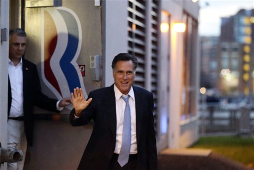 Republican presidential candidate Gov. Mitt Romney leaves his campaign headquarters in Boston on Sunday.