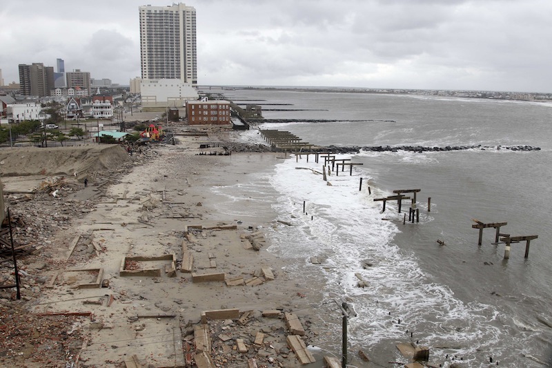 Foundations and pilings are all that remain of brick buildings and a boardwalk in Atlantic City, N.J., Tuesday, Oct. 30, 2012, after they were destroyed when a powerful storm that started out as Hurricane Sandy made landfall on the East Coast on Monday night. (AP Photo/Seth Wenig)