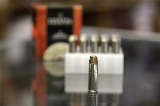A box of ammunition is seen on the counter of a gun shop in Tinley Park, Ill. A Cook County officials is proposing a tax of five cents a bullet. and a dollar for a box of 20.