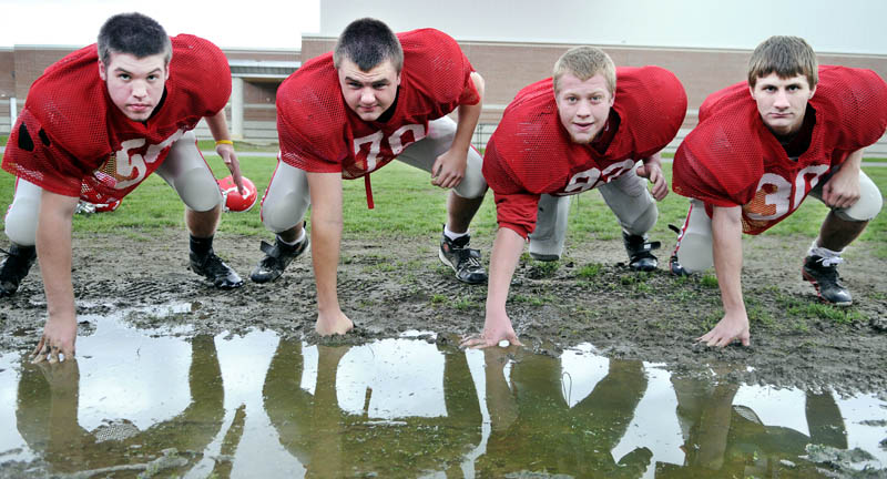 MAKING PLAYS: From left, are Sam Hopkins, Josh Woodward, Eric Cook and Keith Cloutire are part of a Cony High School defense that is allowing 16.3 points per game.